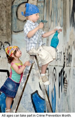 Kids Removing Graffiti Caption