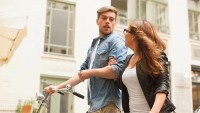 Couple Strolling with Bicycle